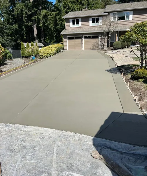 Broom Finish Driveway With Decorative Borders in Edmonds 